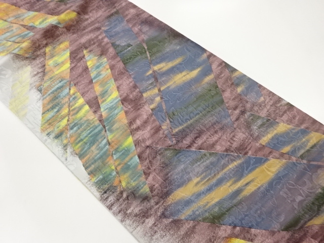 纐纈抽象に花唐草模様織出し全通洒落袋帯